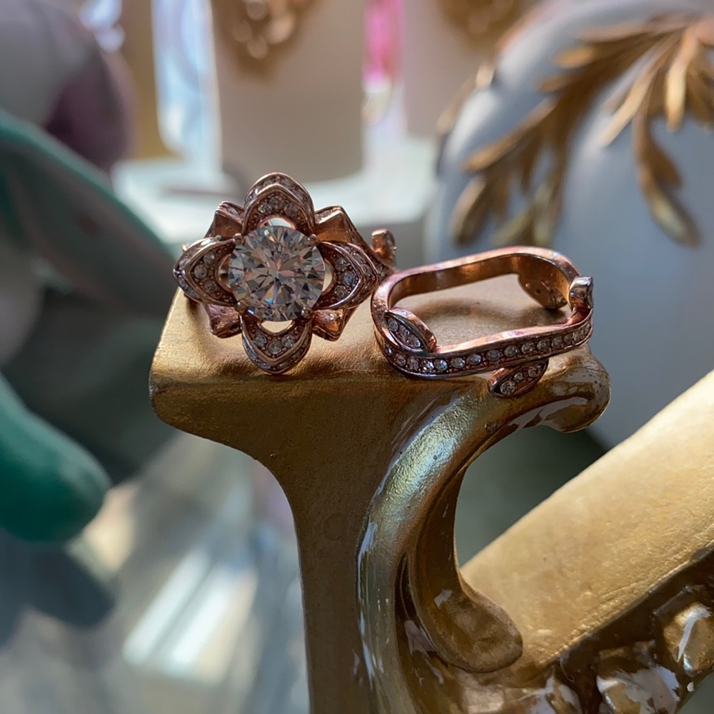 Rose gold flower ring with matching band.